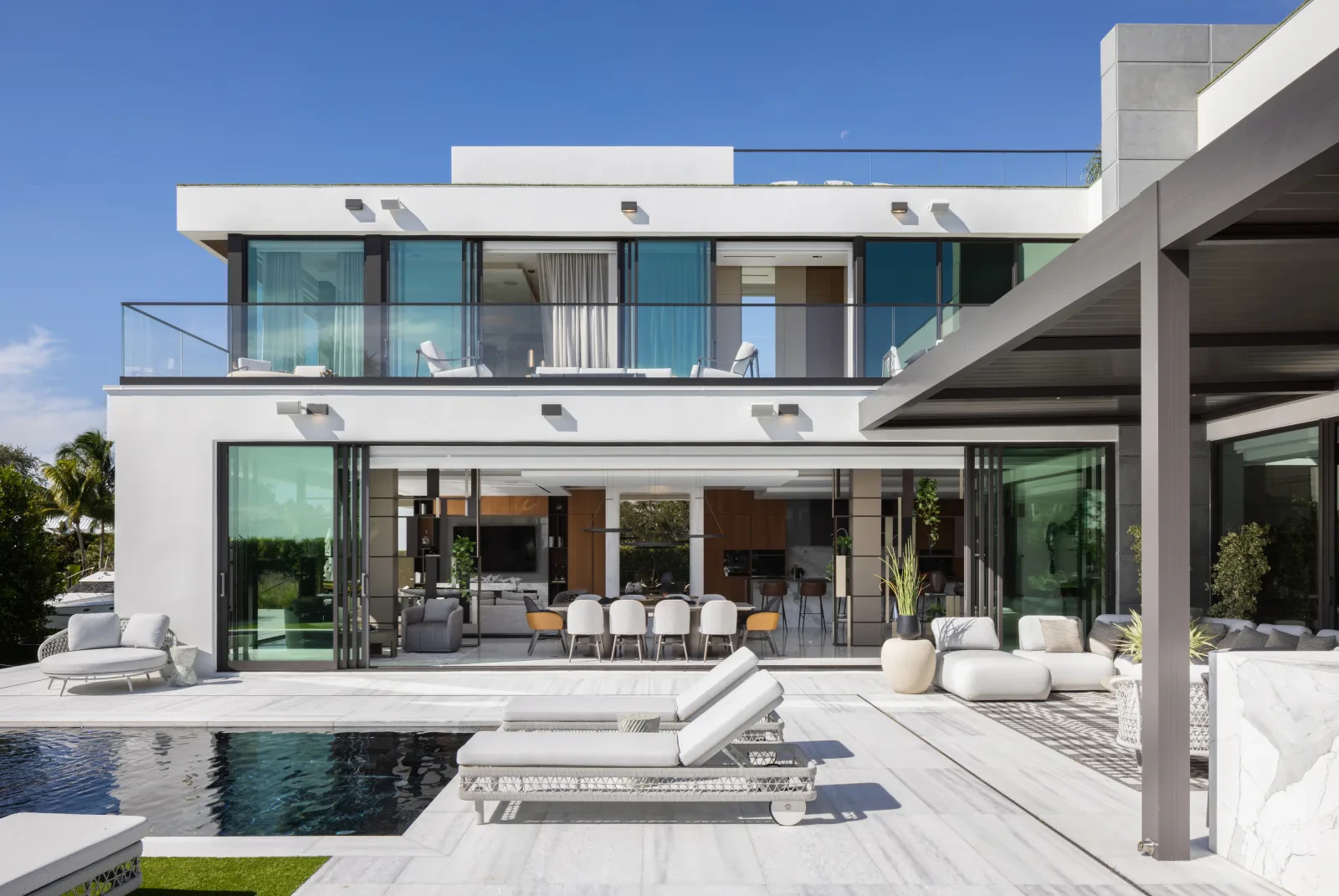 Monarch House — open living area with floor-to-ceiling glass