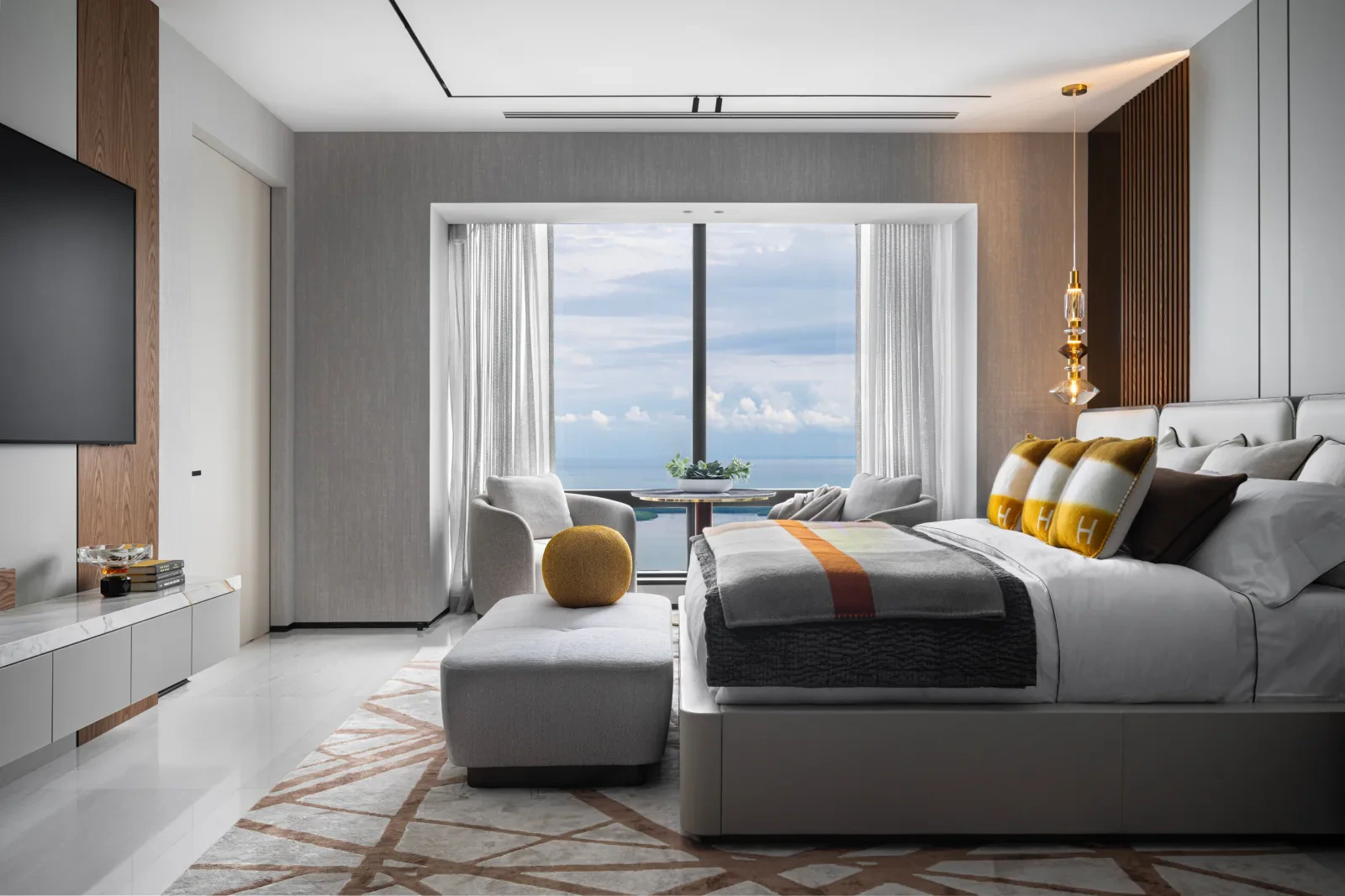 Odyssey Lower Penthouse — living room with curated art